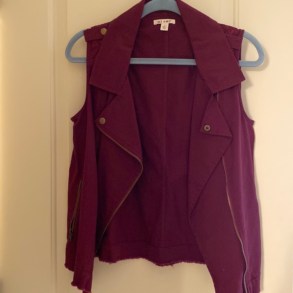 Maroon vest with wide lapel and floral accent on shoulders